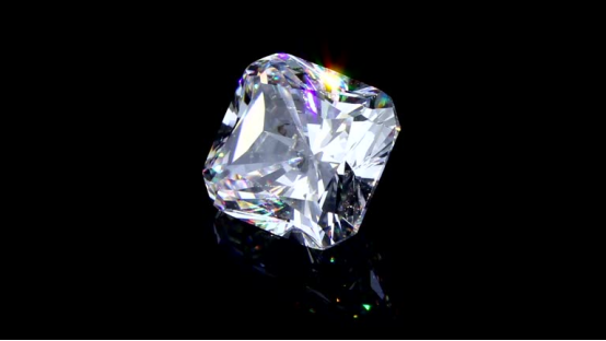 Polished Asscher-cut lab grown diamond on a black background, showcasing its step-cut facets and brilliance as a centerpiece for an engagement ring.